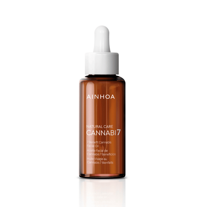 Billedet viser hudplejeproduktet AINHOA CANNABI7 - 7 Benefit Cannabis Ansigtsolie, et revolutionerende vegansk og naturligt hudplejeprodukt med Cannabisolie